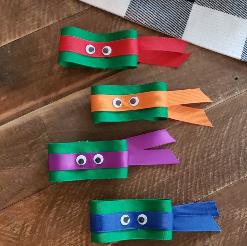 Set of 4 ninja turtle hair clips, handmade by me.